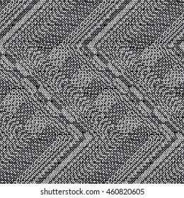 Abstract charcoal flecked zigzag motif. Seamless pattern.