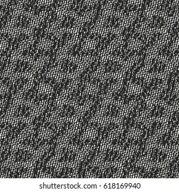 Abstract charcoal mottled checked motif. Seamless pattern.