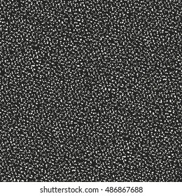 Abstract charcoal noisy textured background. Seamless pattern.