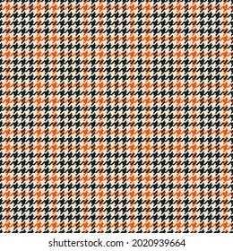 Abstract check pattern in black, orange, beige. Seamless pixel textured houndstooth plaid vector background for jacket, coat, scarf, dress, other modern spring autumn winter fashion fabric print.