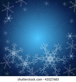 Abstract Christmas background with snow and snowflake on blue background