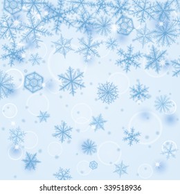 Abstract Christmas background with various blue snowflakes.