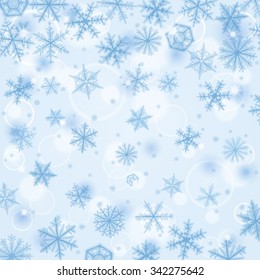 Abstract Christmas background with various blue snowflakes.