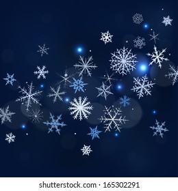 Abstract Christmas background with various snowflakes.