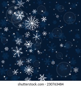 Abstract Christmas background with various snowflakes.