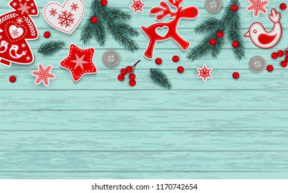 Abstract christmas border, red and white stylized Scandinavian decorations, branches of Christmas tree, snowflakes and holly berries lying on blue wooden desk with place for text, vector illustration