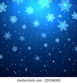 Abstract Christmas snowfall blue vector background.