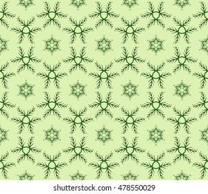 abstract Christmas snowflakes. Green color background. Seamless vector illustration. For design and printing.
