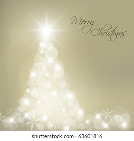 Abstract Christmas tree made of light and snow flakes