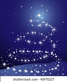 Abstract christmas tree on blue background made form many snowflake