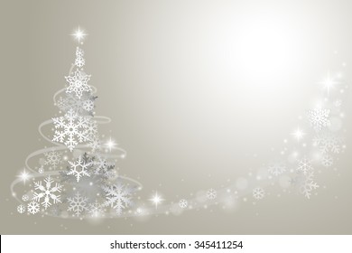 Abstract Christmas tree from snowflakes on grey background