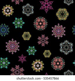 Abstract Christmass illustration with neutral, green and blue snowflakes on black background. Vector Christmas party design template.