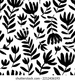 Abstract chrysanthemum blooming seamless pattern. Brush drawn wild flowers on stems with pungent leaves. Vector black flower imprints. Hand drawn botanical ornament with black silhouettes.