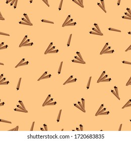 Abstract cinnamon spice pattern on beige background