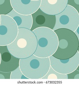abstract circular leaves seamless tile in blue green