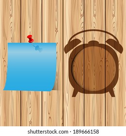 abstract clock frame with blue paper on wood background can used for template/web design.