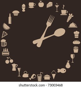 abstract clock made of spoon, fork and food