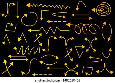 abstract collection of hand drawn arrows for the design concept, isolated gold with a black background - vector