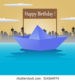 Abstract colorful background with a blue paper boat with the text Happy Birthday floating on the water