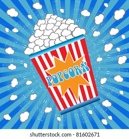 Abstract colorful background with a box filled up with popcorn