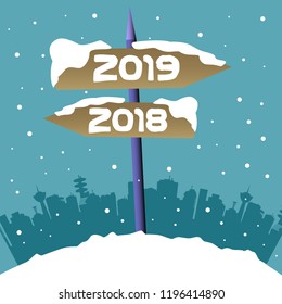 Abstract colorful background with two plates pointing the past year direction 2018 and the New Year direction 2019