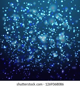 Abstract colorful bokeh and glowing spakling shining particles in random blue color theme background. Lighting effects of flash. Blurred vector background with light glare, EPS10 illustration.