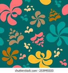 Abstract colorful floral seamless pattern on green background. Vector illustration.