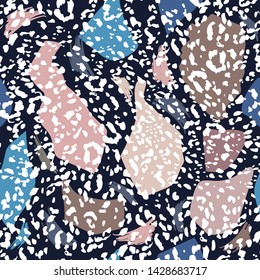 Abstract colorful freehand shape and brush seamless pattern with animal leopard print. Trendy Modern style abstract design for fashion,fabric,wallpaper,wrapping and all prints on navy blue background