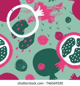Abstract colorful pomegranate seamless pattern. Hand drawn brush grunge garnet fruit background.