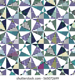 Abstract colorful psychedelic triangles seamless pattern.