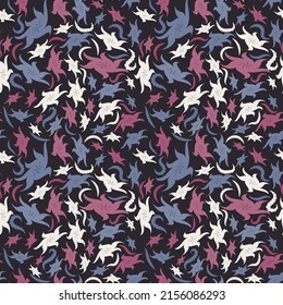 Abstract colorful seamless pattern. Curved multi-colored star-shaped shapes of different sizes are randomly arranged on a dark background. Vector.