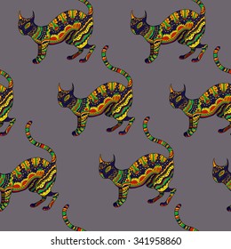 Abstract colorful seamless  pattern with ornamental cats.
