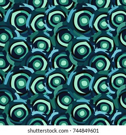 Abstract colorful seamless pattern out of circular geometric shapes. Bright blue and green colors.