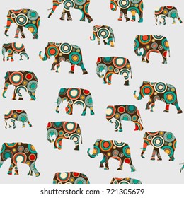 Abstract colorful seamless pattern with silhouettes of elephants