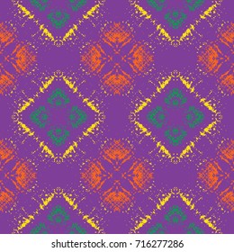 Abstract colorful seamless pattern of violet, orange, green, and yellow shades