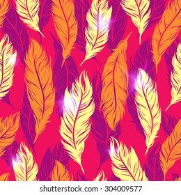 Abstract colorful seamless pattern with yellow feathers symbols on the pink background.