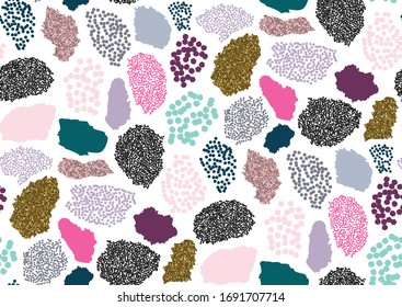 Abstract colorful terrazzo seamless pattern with gold glitter texture elements. Fashion & style.