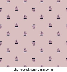 Abstract cozy seamless pattern with little mittens hand drawn print. Pink background. Vector illustration for seasonal textile prints, fabric, banners, backdrops and wallpapers.