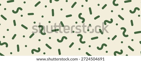 Abstract cream background with random green letters