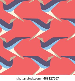Abstract creative and contemporary seamless pattern design with colorful geometric and stylized birds. Clean, strong and trendy repeat background for modern surfaces
