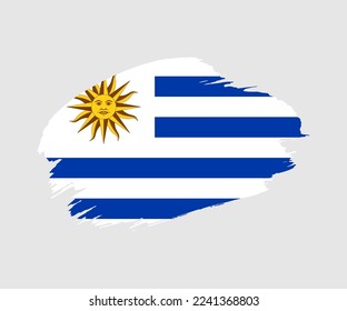 Abstract creative painted grunge brush flag of Uruguay country with background