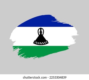 Abstract creative painted grunge brush flag of Lesotho country with background