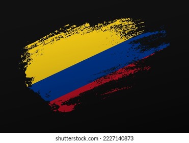 Abstract creative patriotic hand painted stain brush flag of Colombia on black background