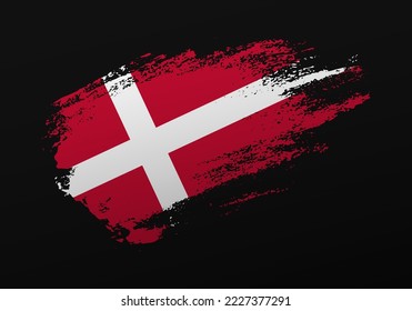 Abstract creative patriotic hand painted stain brush flag of Denmark on black background