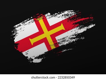 Abstract creative patriotic hand painted stain brush flag of Guernsey on black background