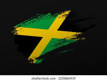 Abstract creative patriotic hand painted stain brush flag of Jamaica on black background