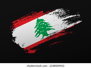 Abstract creative patriotic hand painted stain brush flag of Lebanon on black background