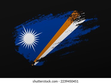Abstract creative patriotic hand painted stain brush flag of Marshall Islands on black background