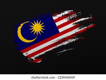 Abstract creative patriotic hand painted stain brush flag of Malaysia on black background