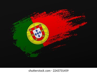 Abstract creative patriotic hand painted stain brush flag of Portugal on black background